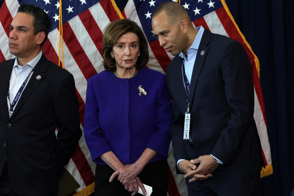 Jeffries speaks with then House Speaker Nancy Pelosi during a news conference in March 2022.