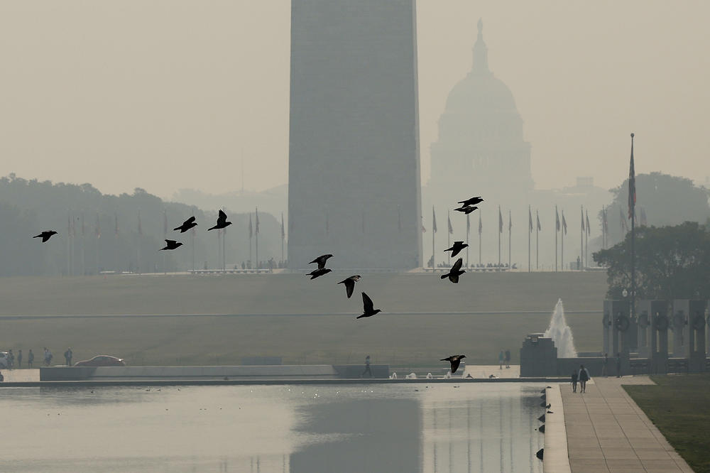 Wildfire smoke casts a haze over the National Mall on Wednesday in Washington, D.C.