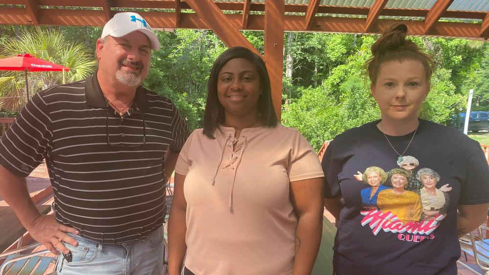 Jamie Insley, Brittany McMillian and April Thomas first started attending Patriotic Millionaires meetings in Whiteville, N.C., last year. They say what they've learned has helped them understand why it's become harder to make a good living.