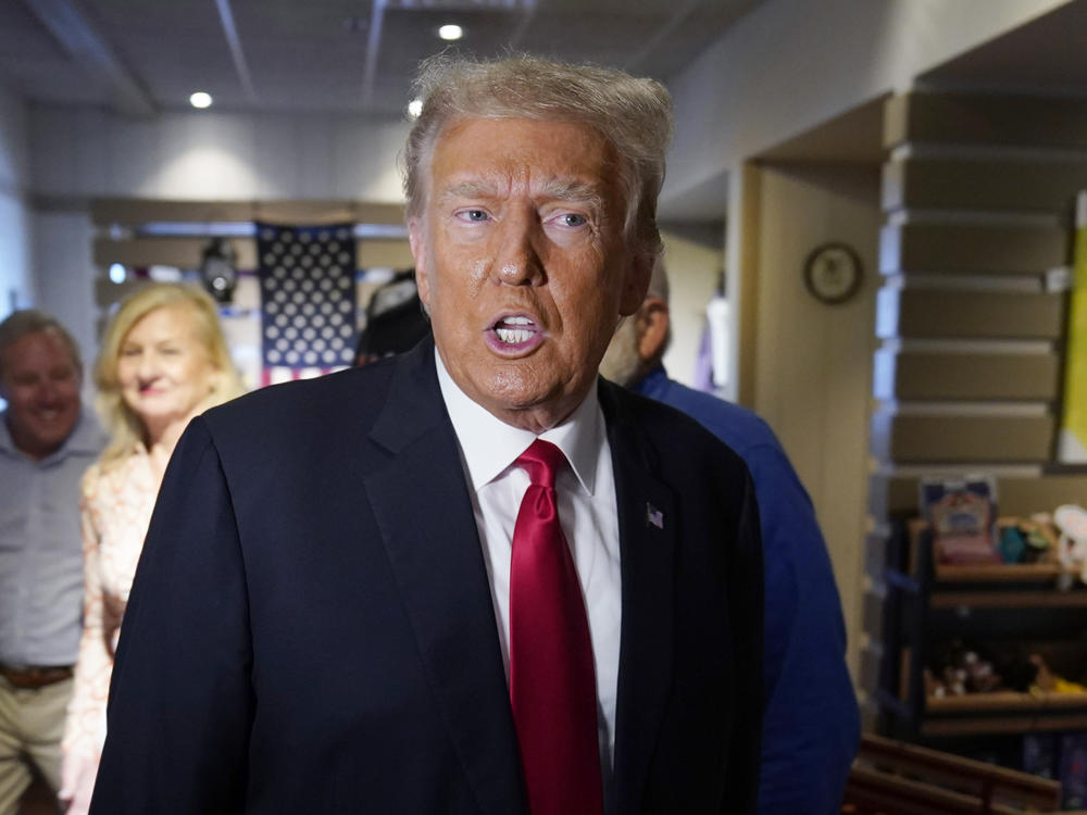 Former President Donald Trump greets supporters before speaking at the Westside Conservative Breakfast, Thursday, June 1, 2023, in Des Moines, Iowa.