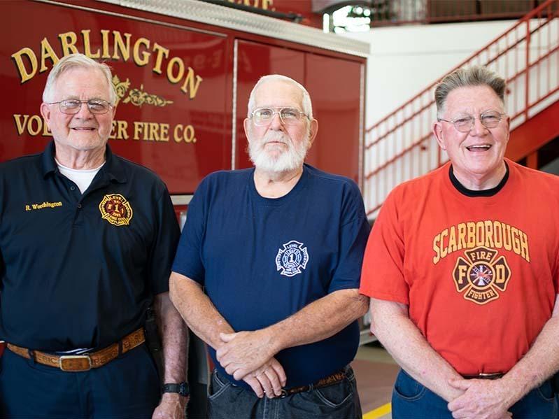 Robert Worthington, Buddy Tester and Jerry Scarborough, three volunteer firefighters in Maryland, are all over the age of 65.
