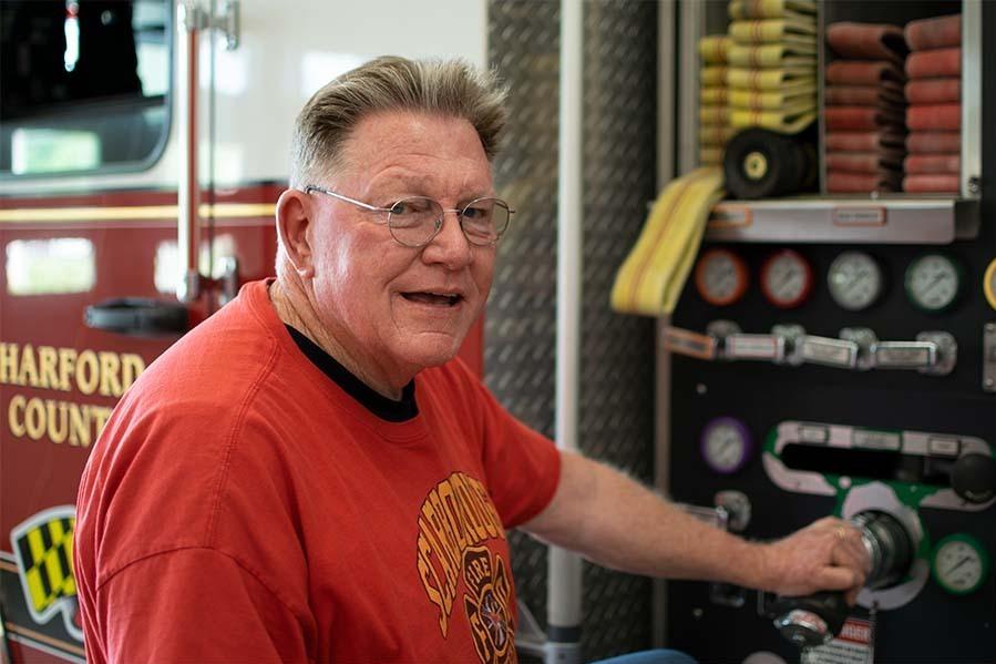 Jerry Scarborough, 69, at the pump panel of Darlington Volunteer Fire Company's Engine 913 in Street, Maryland.