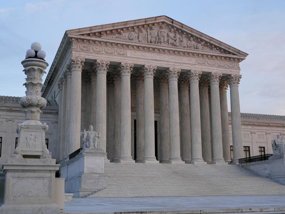 The setting sun illuminates the Supreme Court building on Capitol Hill in Washington, D.C., on Jan. 10.