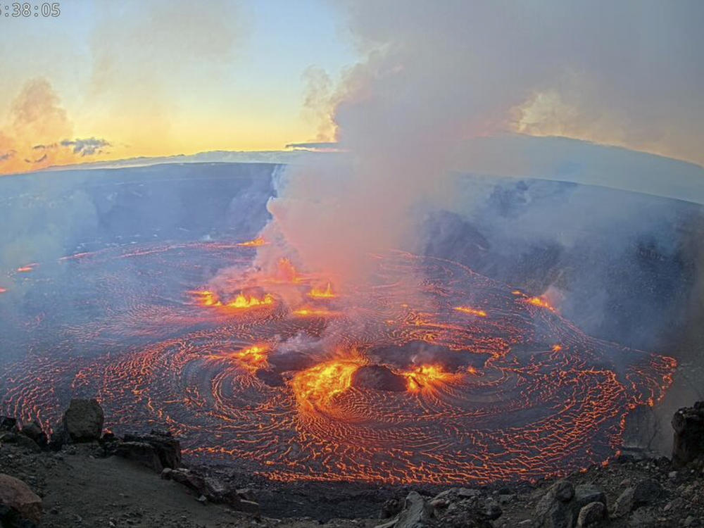 In this webcam image provided by the U.S. Geological Survey, an eruption takes place on the summit of the Kilauea volcano in Hawaii, Wednesday morning, June 7, 2023.