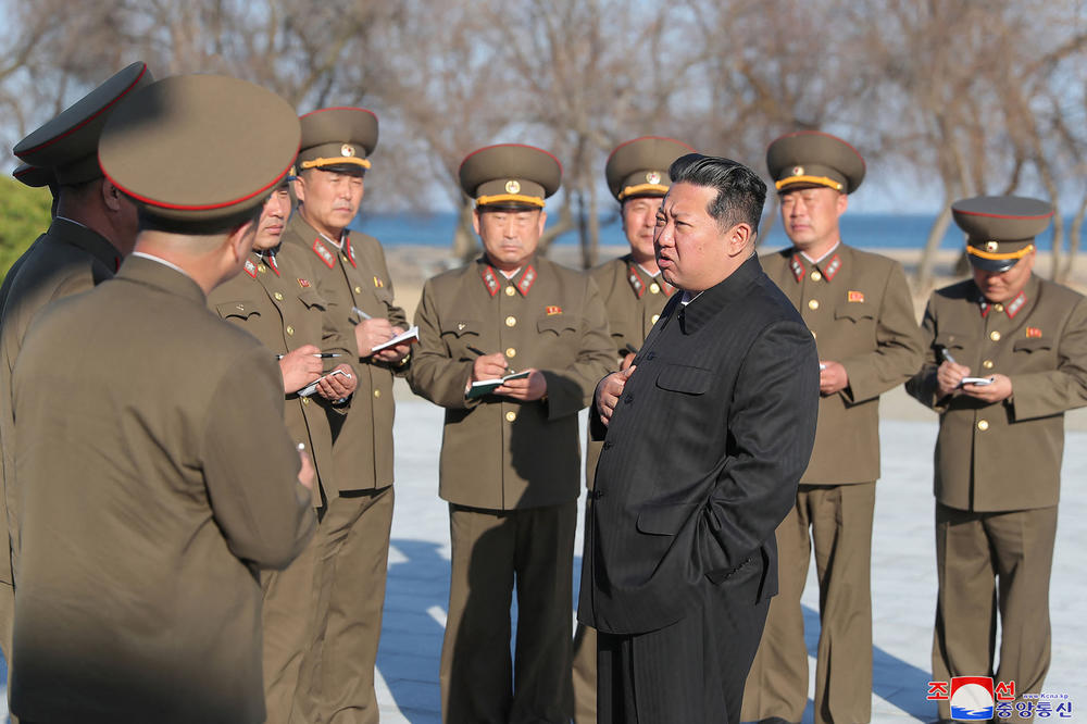 This undated handout picture released from North Korea's official Korean Central News Agency in April 2022 shows North Korean leader Kim Jong Un as he observes the test-fire of a new-type tactical guided weapon in North Korea.