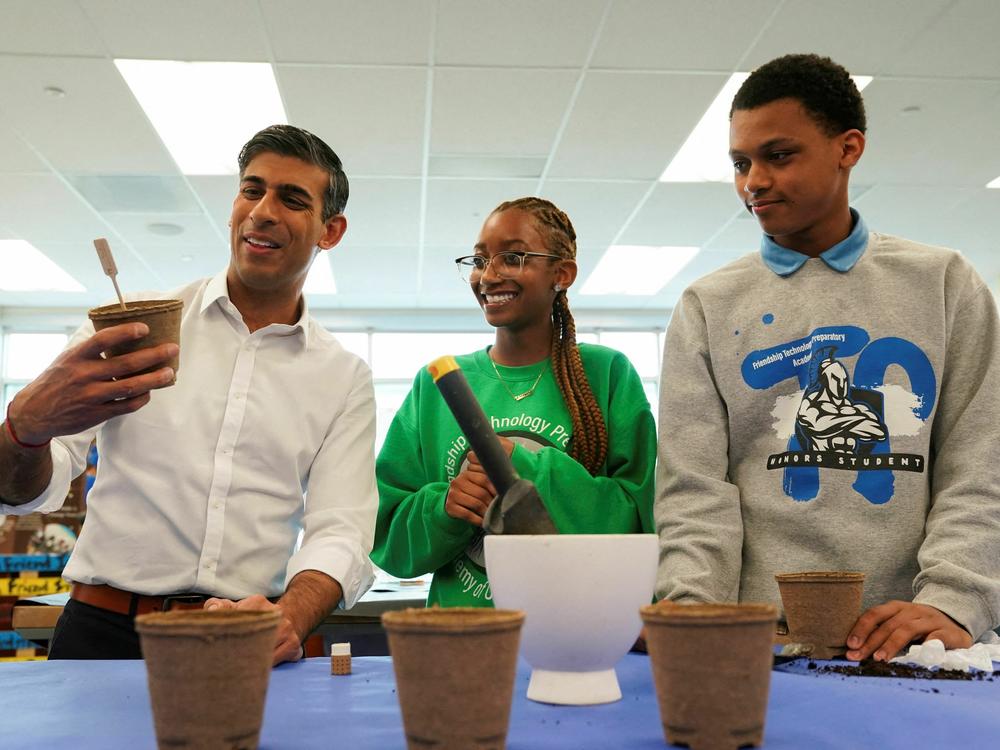 Sunak takes part in a sustainability project during a visit Wednesday to the Friendship Technology Preparatory High School in Washington, D.C. He meets with President Biden on Thursday.