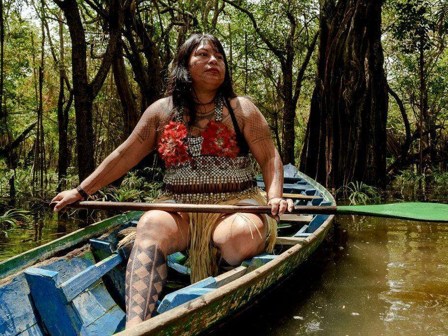Alessandra Korap Munduruku, one of this year's winners of the Goldman Environmental Prize, afloat in her native Sawré Muybu Indigenous Territory in Brazil. She was honored for her activism to protect the rainforest from industrial projects. 