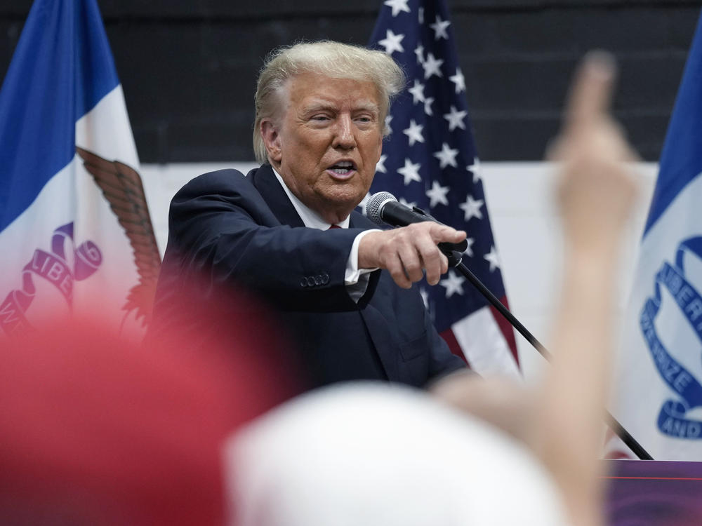Former President Donald Trump visits with campaign volunteers at the Grimes Community Complex Park on June 1 in Des Moines, Iowa.