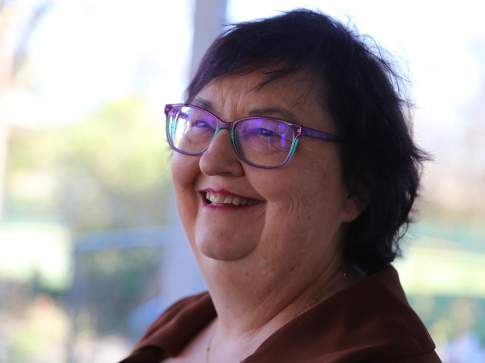 Sharon Gwinn doesn't want dementia to harm her finances if she should come down with it. She designated her oldest daughter as her power of attorney and set up a tool to flag any unusual financial behavior. This added protection makes Gwinn feel lighter.