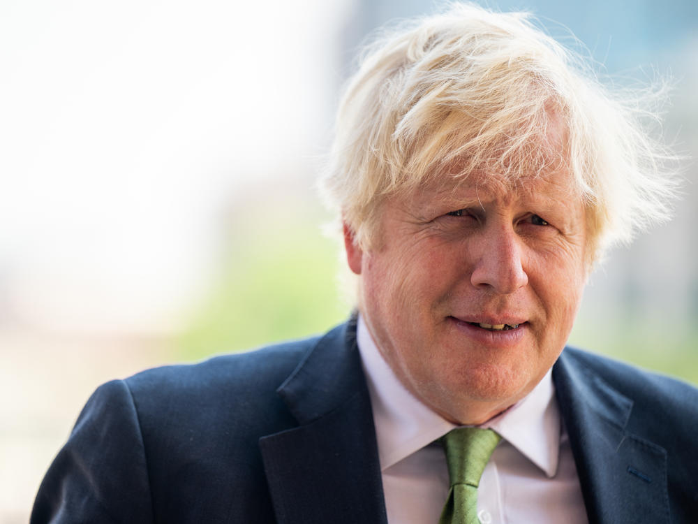 Former U.K. Prime Minister Boris Johnson looks on during a tour after a meeting with Gov. Greg Abbott at the Texas State Capitol on May 23, 2023 in Austin. Johnson announced Friday that he's stepping down from his seat in Parliament.