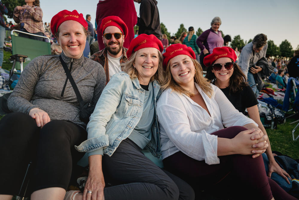 Alexis Tackmann (from left), Andrew Bryant, Donna Hardie, Lezlee Hardie and Jennifer Bryant sport red berets for Joni Mitchell.