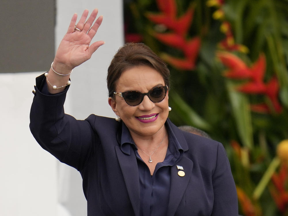 FILE - Honduras' President Xiomara Castro waves during the swearing-in ceremony for Colombia's President Gustavo Petro in Bogota, Colombia, Sunday, Aug. 7, 2022. Castro has flown to China on Tuesday, June 6, 2023, to meet with President Xi Jinping.