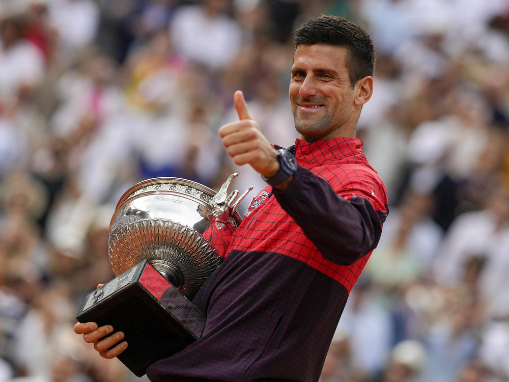 Serbia's Novak Djokovic celebrates winning the men's singles final match of the French Open tennis tournament against Norway's Casper Ruud in three sets at the Roland Garros stadium in Paris, Sunday.