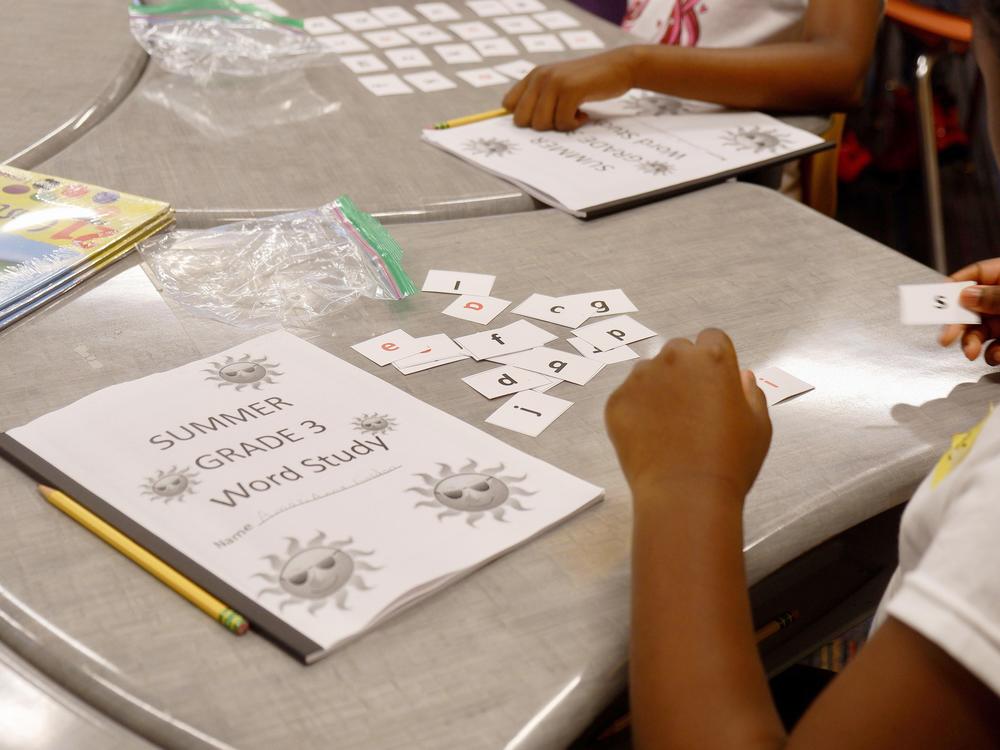 In structured literacy, students spend a lot of time learning how to break words down into bits of sound called phonemes.