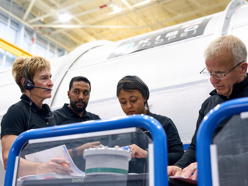 The Ax-2 crew in a training session. The group, composed of Whitson (far left) and three paying costumers, spent nine days in space last month.