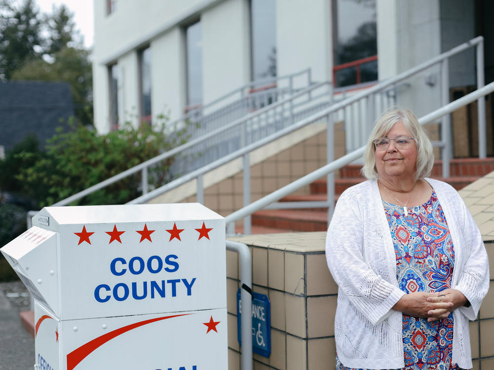 Dede Murphy and other local election workers say members of an election denier group camped out in the hallways of their county building and yelled in their faces. Some say they were followed home or put in physical danger. Election workers across 22 states tell NPR they've received threats or felt unsafe doing their jobs.