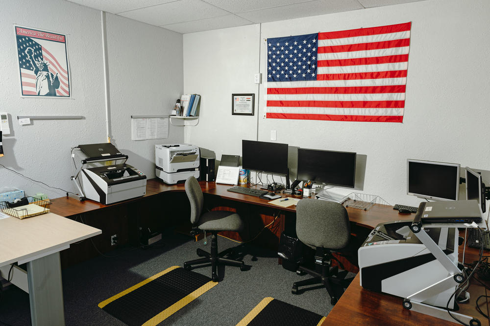 Scanners and computers used to count ballots are seen inside the Coos County elections office.