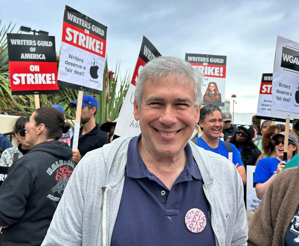 Chris Keyser is co-chair of the WGA's negotiating committee. He protested outside of CBS Studios in L.A. before leafletting outside an Apple store on the union's 