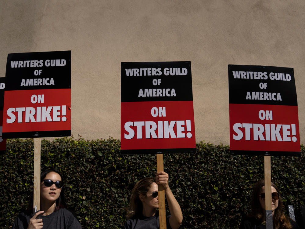 Screenwriters around the world are organizing pickets and other actions on June 14 in support of the ongoing Writers Guide of America strike. Above, Writers Guild of America workers picket outside the Warner Brother studios, on May 2, 2023 in Burbank, Calif.