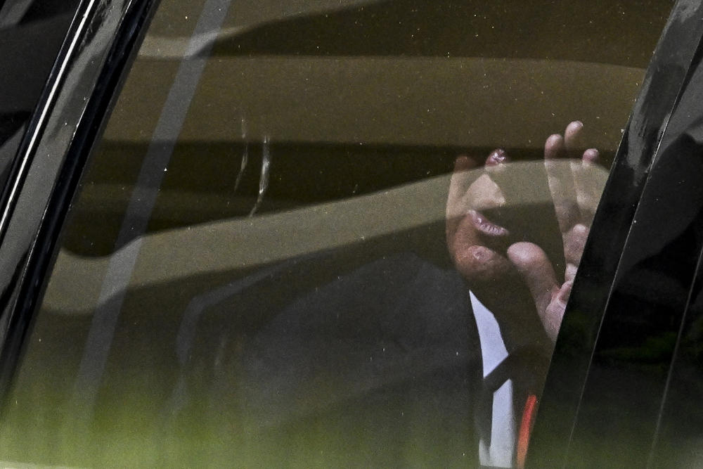 Former President Trump arrives to the Wilkie D. Ferguson Jr. United States Courthouse in Miami on Tuesday.