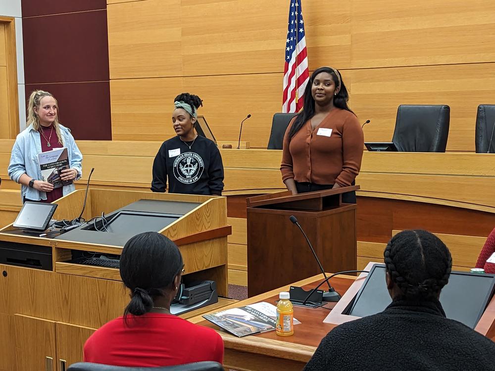 Michigan State University law students lead a presentation at Ferndale High School.