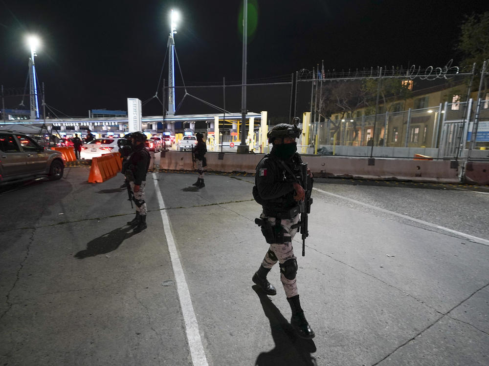 Mexican National Guards patrol among the lanes of cars entering the San Ysidro Port of Entry in Tijuana, Mexico, May 11, 2023. Montserrat Caballero, the mayor of the Mexican border city of Tijuana, said on June 12, 2023 she has decided to go live at an army base for her own safety, after she received threats.