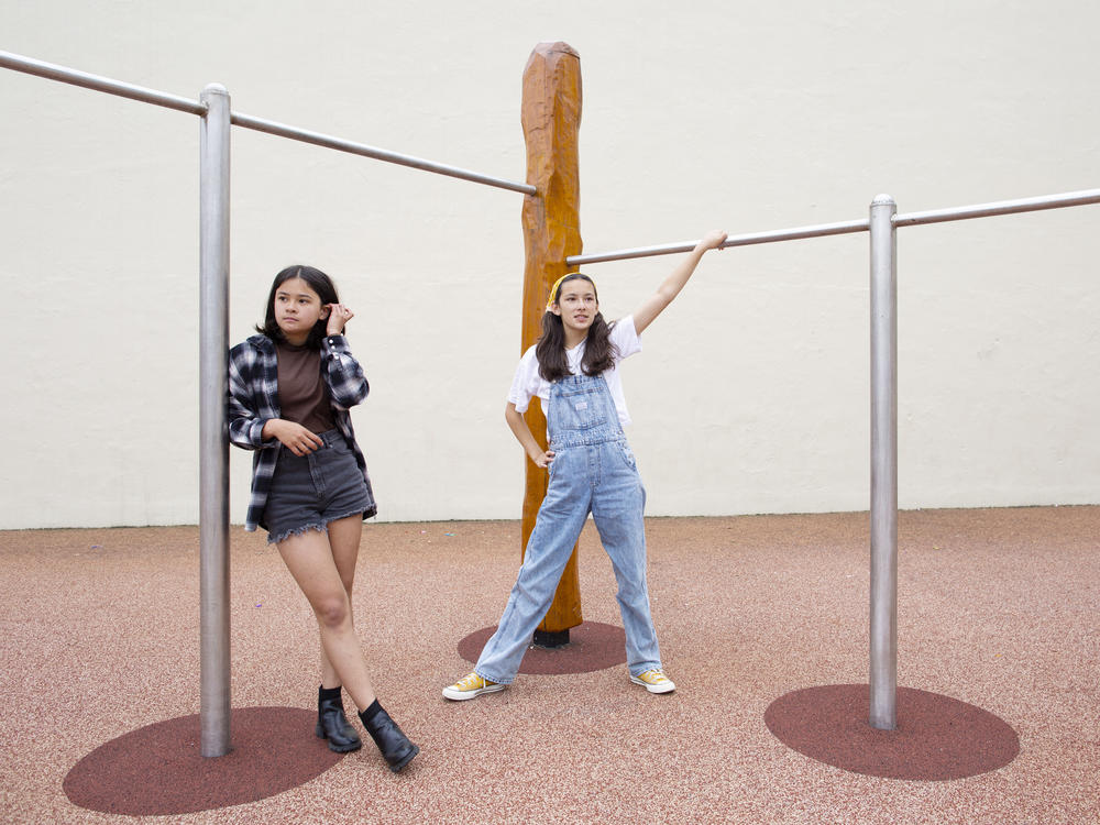 Norah Weiner (L) and Erika Young (R), the grand-prize winners in grades 5-8 of NPR's Student Podcast Challenge, at Presidio Middle School in San Francisco.