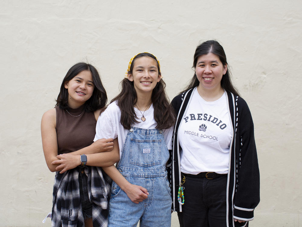 Winners of NPR's Student Podcast Challenge, Norah Weiner and Erika Young, with their teacher Jenny Chio, at Presidio Middle School in San Francisco.
