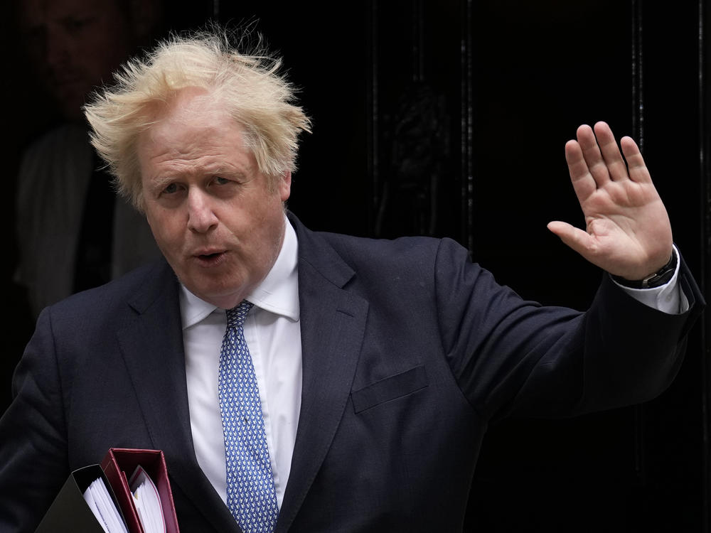 British Prime Minister Boris Johnson is shown leaving 10 Downing Street to attend the weekly Prime Minister's Questions at the Houses of Parliament, in London, on May 25, 2022.