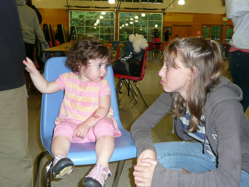 Sadie Leiman (left), pictured here as a baby at Camp Kalsman in 2008 with Leah Bordman, who was attending the camp and is now a Jewish educator.