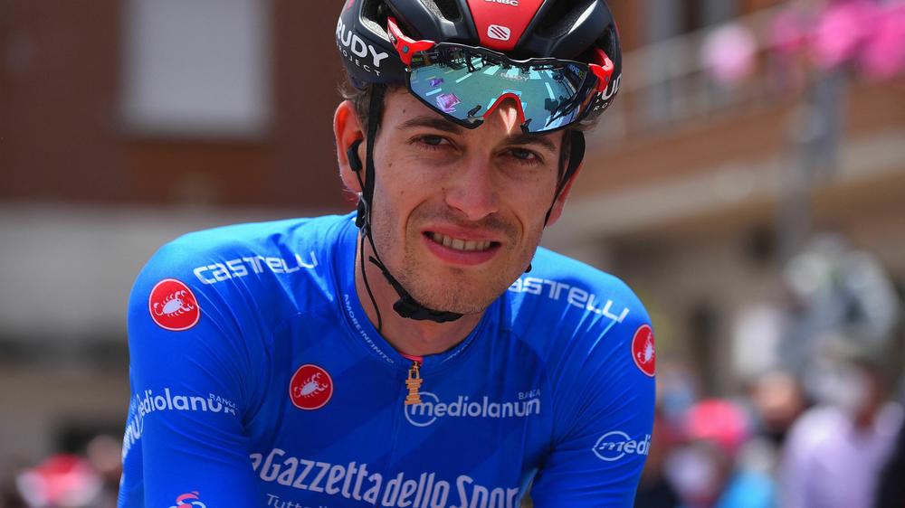 Team Bahrain cyclist Gino Mäder of Switzerland died after suffering a terrible crash in the Tour de Suisse. He's seen here at the 2021 Giro d'Italia road race, wearing the blue jersey signifying the best climber.