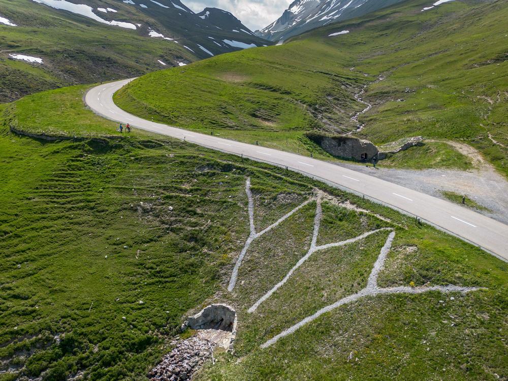 An aerial photo from June 16, 2023, shows the curve where Swiss rider Gino Mäder crashed during a high-speed descent in the Tour de Suisse.