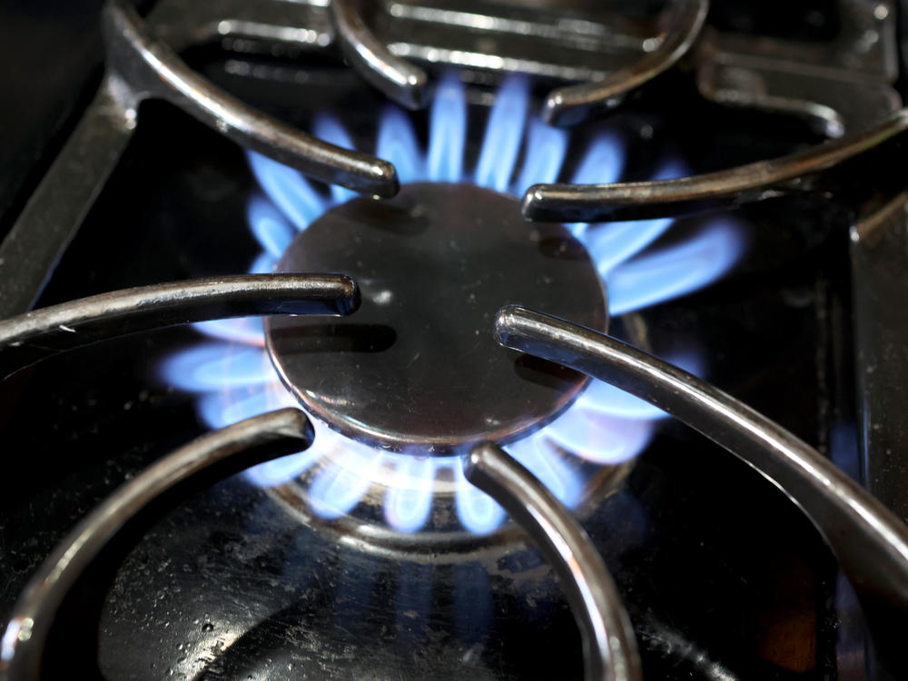 Flames burn on a natural gas-burning stove in Chicago on Jan. 12. New research from Stanford University show gas stoves emit benzene, which is linked to cancer.