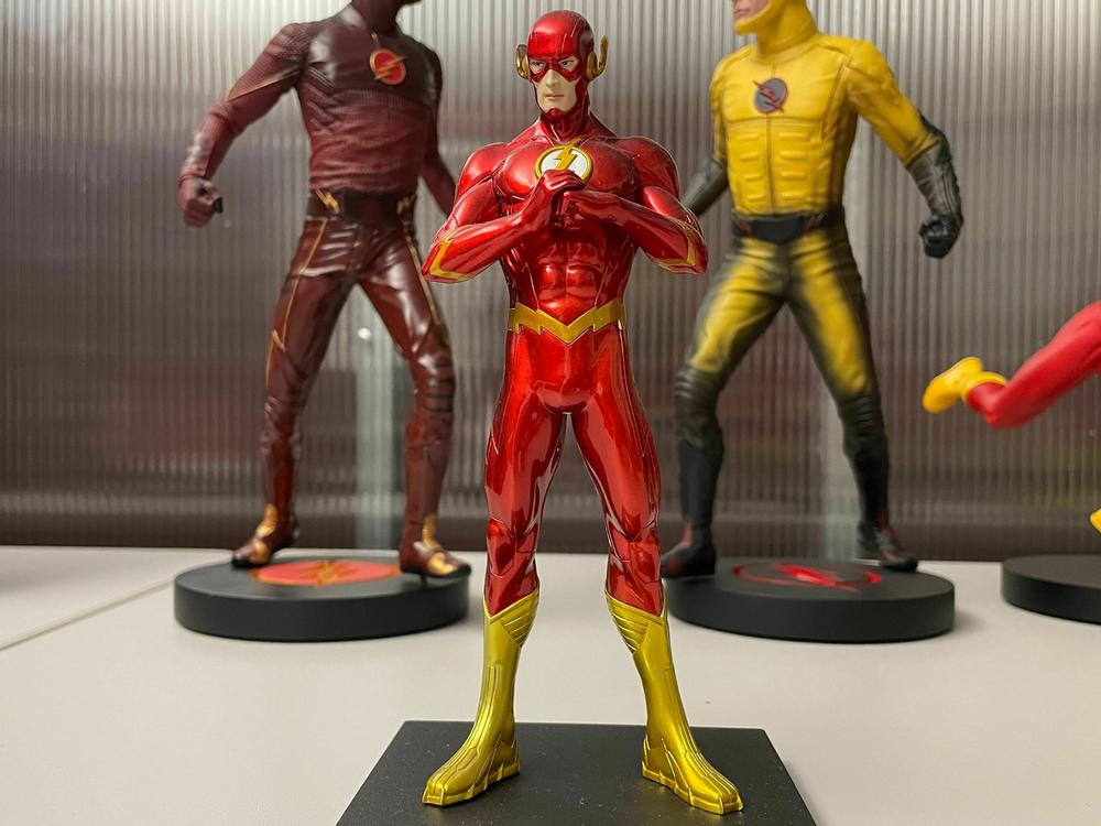 When A Martinez's new work desk looked barren, he picked up this statue of The Flash at a comic book store.