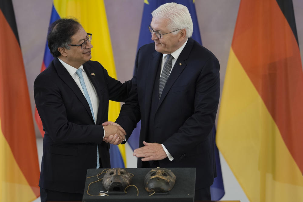 German President Frank-Walter Steinmeier, right, and Colombian President Gustavo Petro shake hands after a ceremony to return two masks of the indigenous community of the Kogi from the Sierra Nevada de Santa Marta in Colombia at Bellevue Palace in Berlin on Friday.