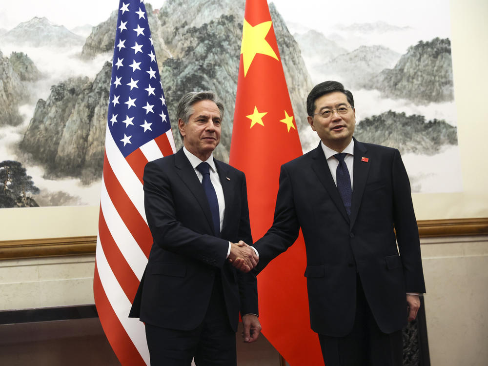 U.S. Secretary of State Antony Blinken, left, shakes hands with Chinese Foreign Minister Qin Gang, right, at the Diaoyutai State Guesthouse in Beijing, China, Sunday, June 18, 2023.