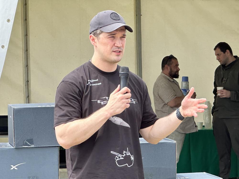 Ukraine's Deputy Prime Minister Mykhailo Federov speaks to drone makers and drone pilot trainers at an event south of Kyiv on June 15. Federov leads the Army of Drones project that has allowed Ukraine to make wide use of drones, for reconnaissance and attacks, offsetting the huge advantage Russia has with its traditional air force.