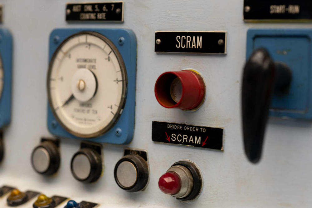 The scram button would shut down the reactor immediately. It could only be done from the reactor's control room (a similar button on the bridge would simply turn on a light below).