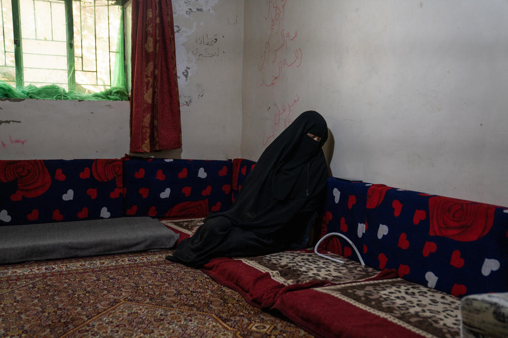 Bashaer Ameen Ali, Abdullah's wife, is in pain from a c-section she had giving birth to their fourth daughter just 15 days ago. She says she wishes her mother could be there to help but her mother lives in a Houthi controlled area and can't visit. 