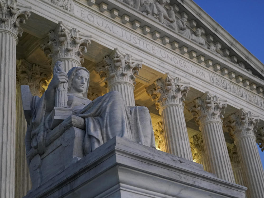 Light illuminates part of the Supreme Court building on Capitol Hill in Washington, D.C., Nov. 16, 2022.