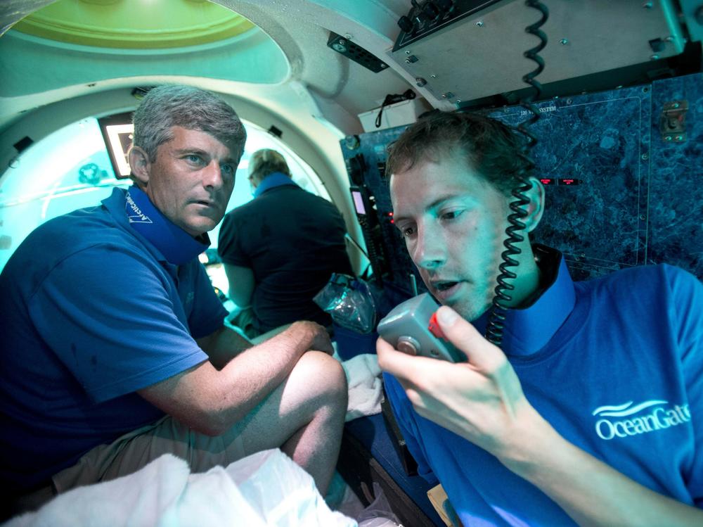 Submersible pilot Randy Holt and Stockton Rush, CEO and co-founder of OceanGate, dive in the company's Antipodes submersible off the Florida coast in 2013. Rescuers are racing to find a missing OceanGate submersible before the oxygen supply runs out for five people, including Rush, who were on a mission to document the wreckage of the Titanic.