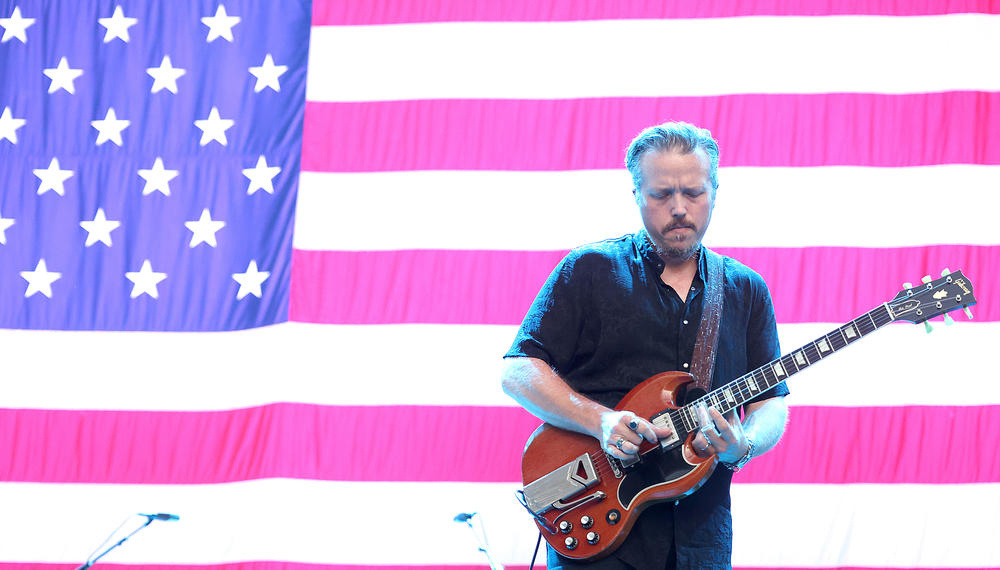 Jason Isbell performs during Willie Nelson's 4th of July Picnic in Austin, Texas on July 04, 2022. Isbell says he sees two audiences for his work — the critics and fans who appreciate glimpses into worlds they might not know, as well as white, blue-collar Americans whose lives resemble the characters in his songs.