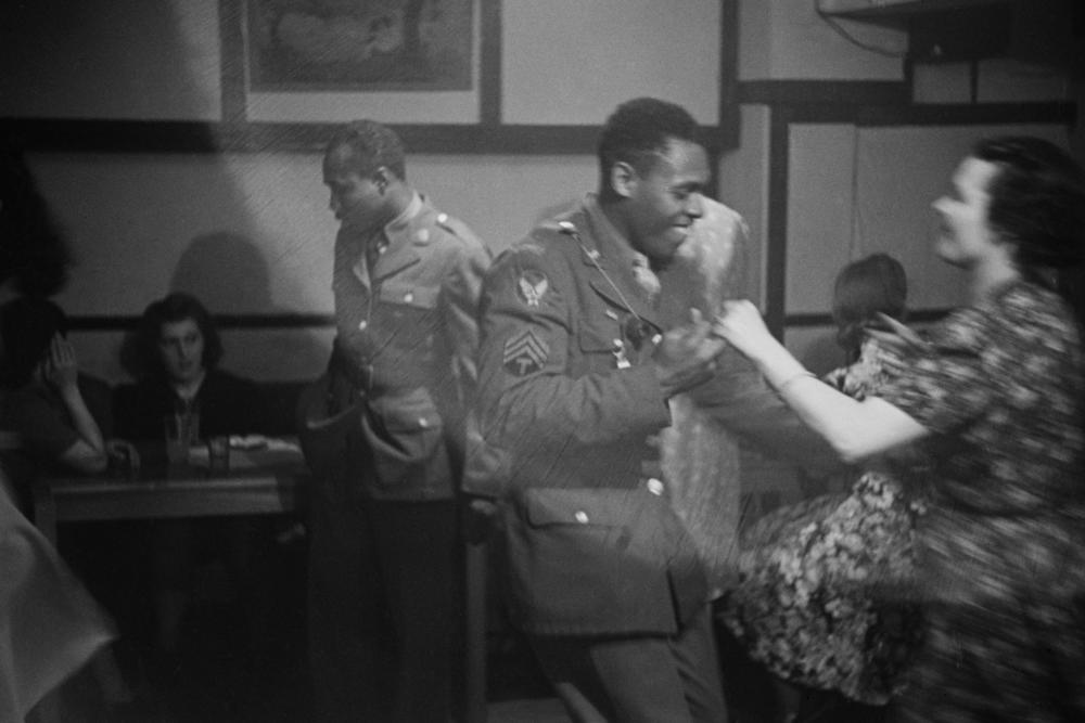 Men and women dancing to the music at the Bouillabaisse International Club, New Compton Street, London, 1943.