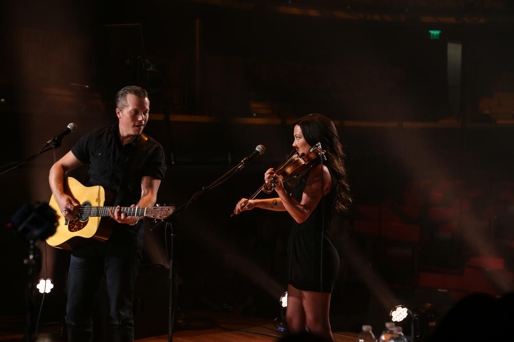 Jason Isbell (left) and Amanda Shires perform together in Nashville in 2016. Isbell and Shires — also a renowned solo artist and a member of the country supergroup The Highwomen — married just days after he completed his 2013 album <em>Southeastern.</em>