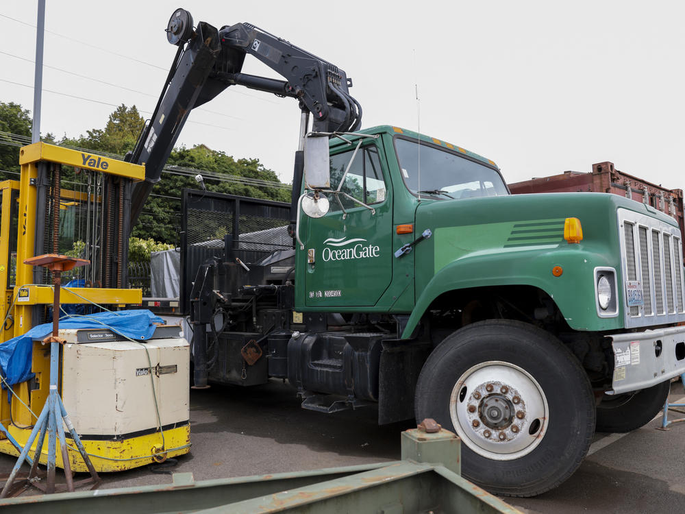 The OceanGate logo is pictured on a truck at the Port of Everett Boat Yard in Everett, Washington, on Tuesday.