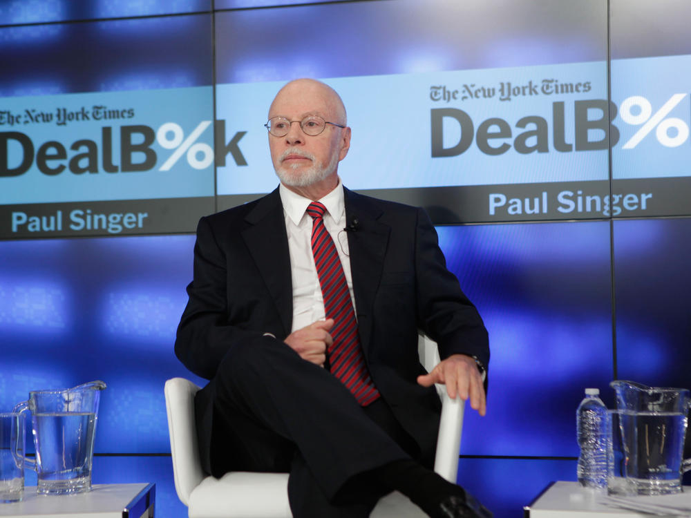 Founder and President, Elliot Management Corporation Paul Singer speaks onstage during The New York Times DealBook Conference in 2014 in New York City.