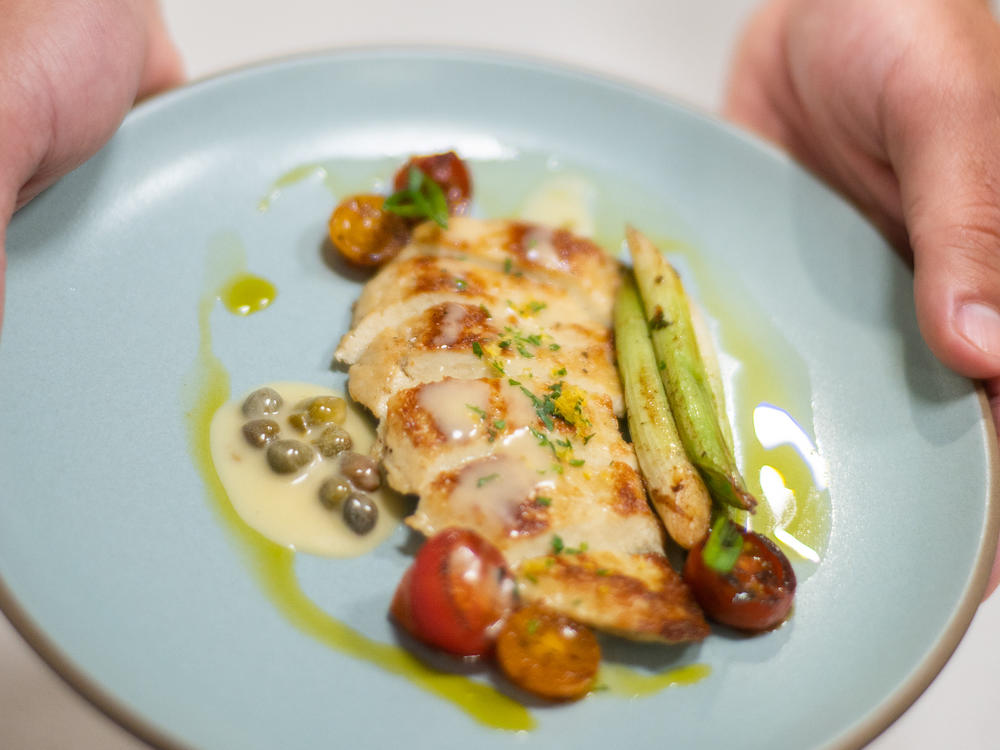 Cultivated Meat is an alternative to traditional meat derived from cells in a lab. In this photo, a chicken breast is prepared at Upside Foods.