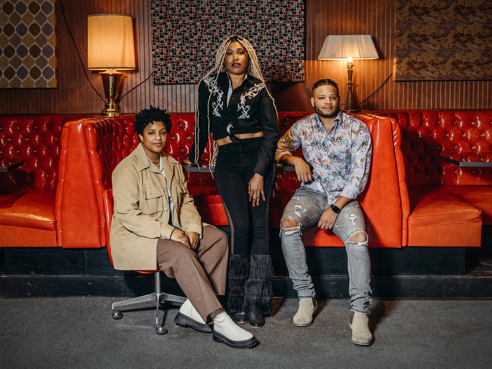 Musicians Denitia, Larysa Jaye and Tylar Bryant pose for a photo before their set at Lulu's Downstairs in Manitou Springs, Colo., on June 17, 2023. They are members of the Black Opry, a touring musical revue dedicated to uplifting Black artists in country music.