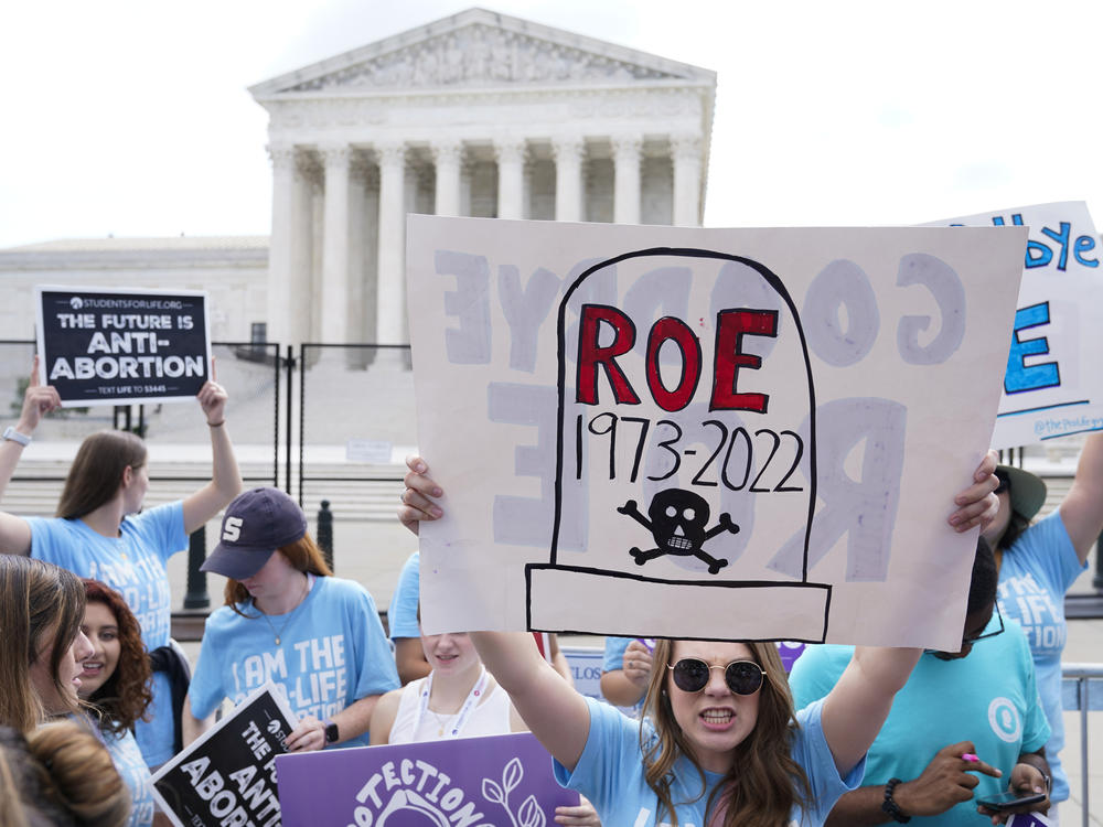 Demonstrators protest about abortion outside the Supreme Court in Washington, June 24, 2022. In the year since, approximately 22 million women, girls and other people of reproductive age now live in states where abortion access is heavily restricted or totally inaccessible.