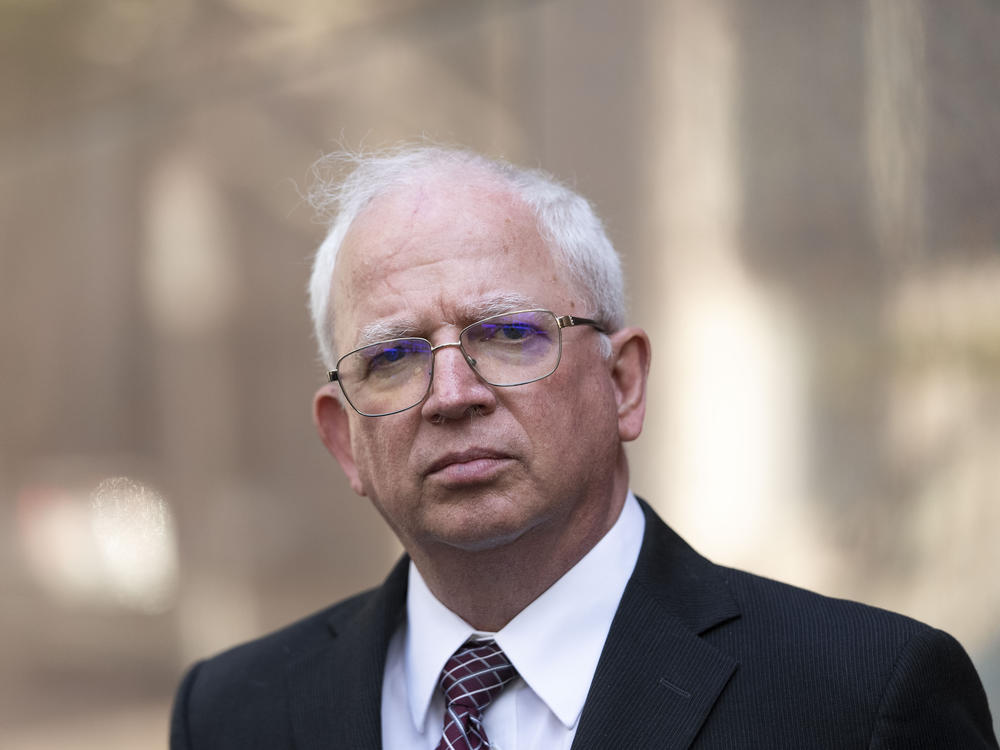Attorney John Eastman stands outside the California State Bar Court in downtown Los Angeles. The State Bar is seeking to revoke Eastman's law license over his work on former President Donald Trump's effort to overturn the 2020 election.